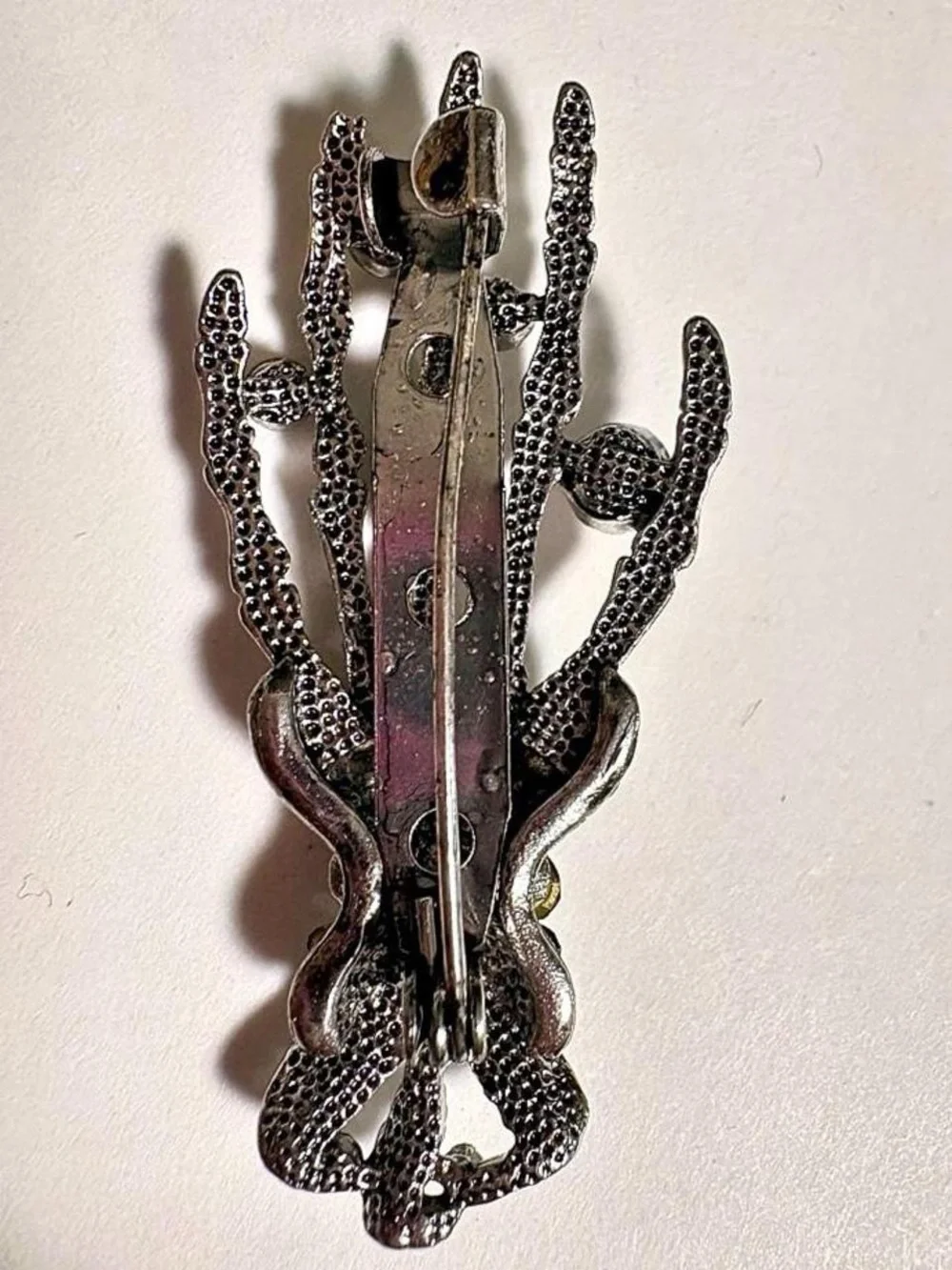 Silver tone Skeleton Hand Brooch with Red and Clear rhinestones